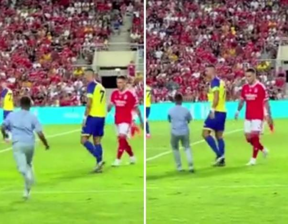 طفل يقتحم ملعب مباراة النصر وبنفيكا ويتوجه إلى رونالدو حاملا حذاء.. شاهد ردة فعل كريستيانو